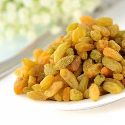 新疆树上黄葡萄干吐鲁番特产批发代发500g 无核黄提子大颗葡萄干图2