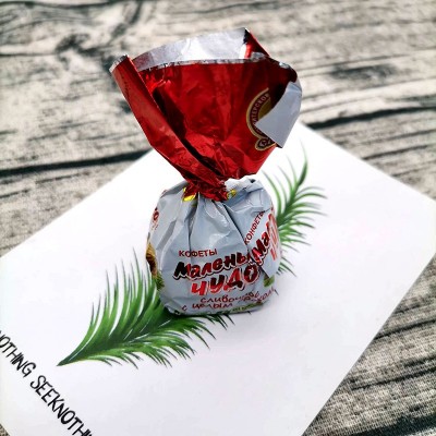 俄罗斯进口食品奶罐糖喜糖斯拉夫巧克力榛子仁夹心糖一件代发500g